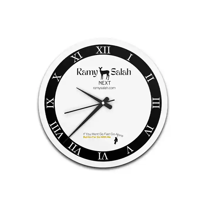 ساعة حائط مودرن بإطار أسود وأرقام رومانية شعار رامي صلاح | Modern wall clock with black frame and Roman numerals Ramy Salah logo