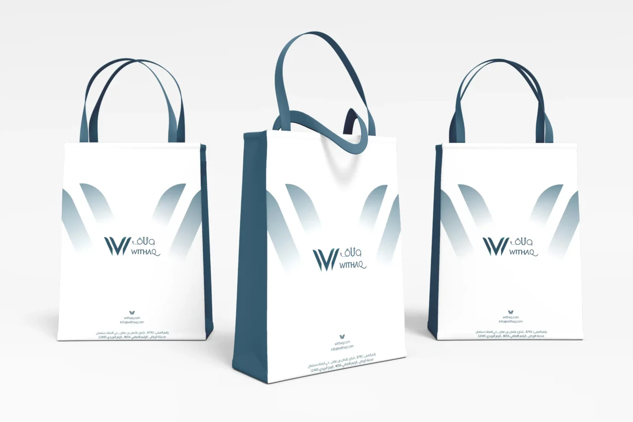 Visual Identity Withaq Co – Ramy Salah تصميم حقائب ورقية (Paper Bags) تحمل الهوية البصرية لشركة وثاق للخدمات المتكاملة - تنفيذ وكالة رامي صلاح. Custom paper bag design featuring the WITHAQ Integrated Services visual identity - executed by Ramy Salah Agency.