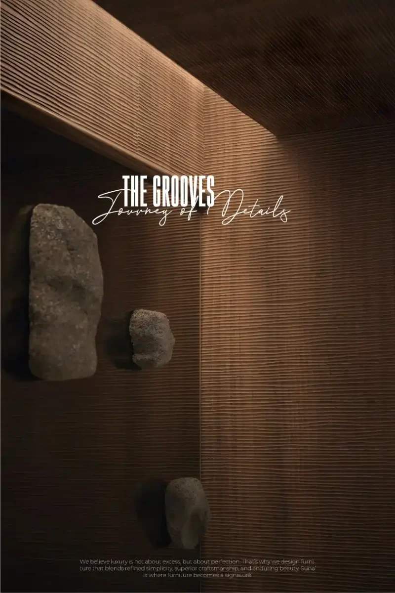 تصميم جدار خشبي مخدد مع عناصر حجرية طبيعية بارزة في مشروع "The Grooves" - تنفيذ وكالة رامي صلاح. Fluted wood wall design featuring protruding natural stone elements for "The Grooves" project - executed by Ramy Salah Agency