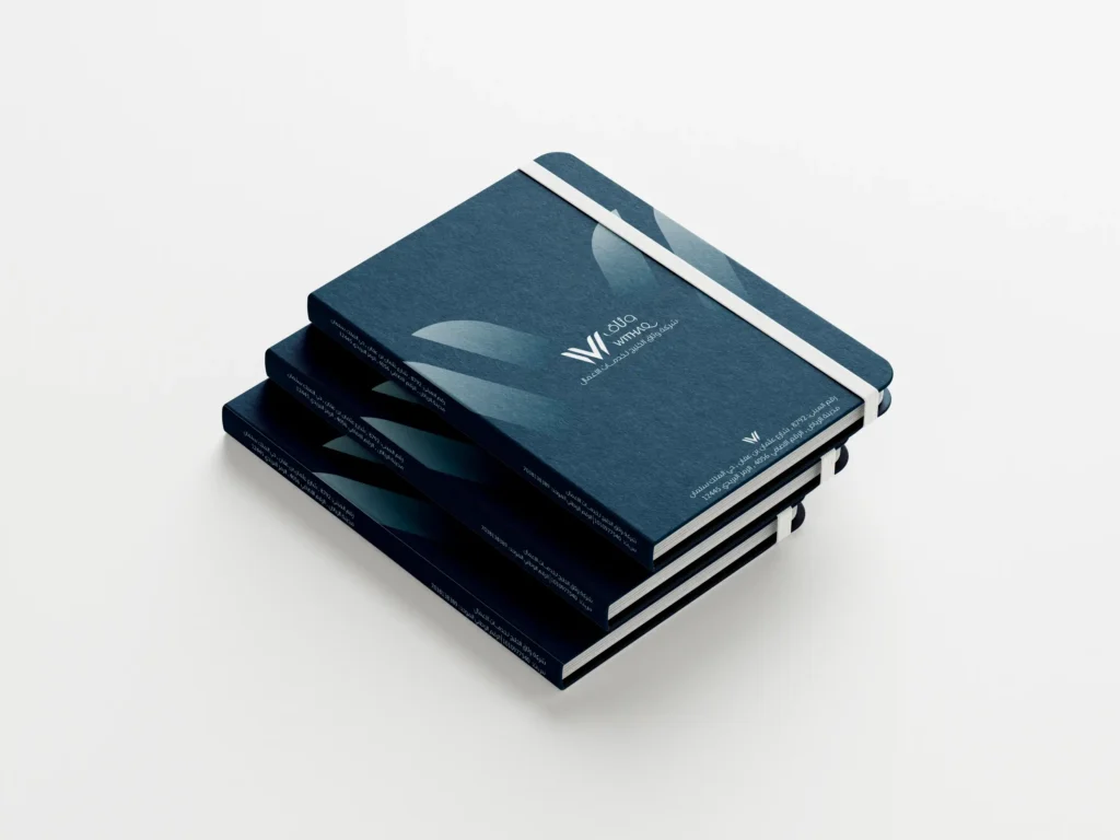Visual Identity Withaq Co – Ramy Salah تصميم وإنتاج دفاتر ملاحظات (Notebooks) مخصصة بشعار شركة وثاق - تنفيذ وكالة رامي صلاح. Design and production of custom branded notebooks featuring the WITHAQ logo - by Ramy Salah Agency.